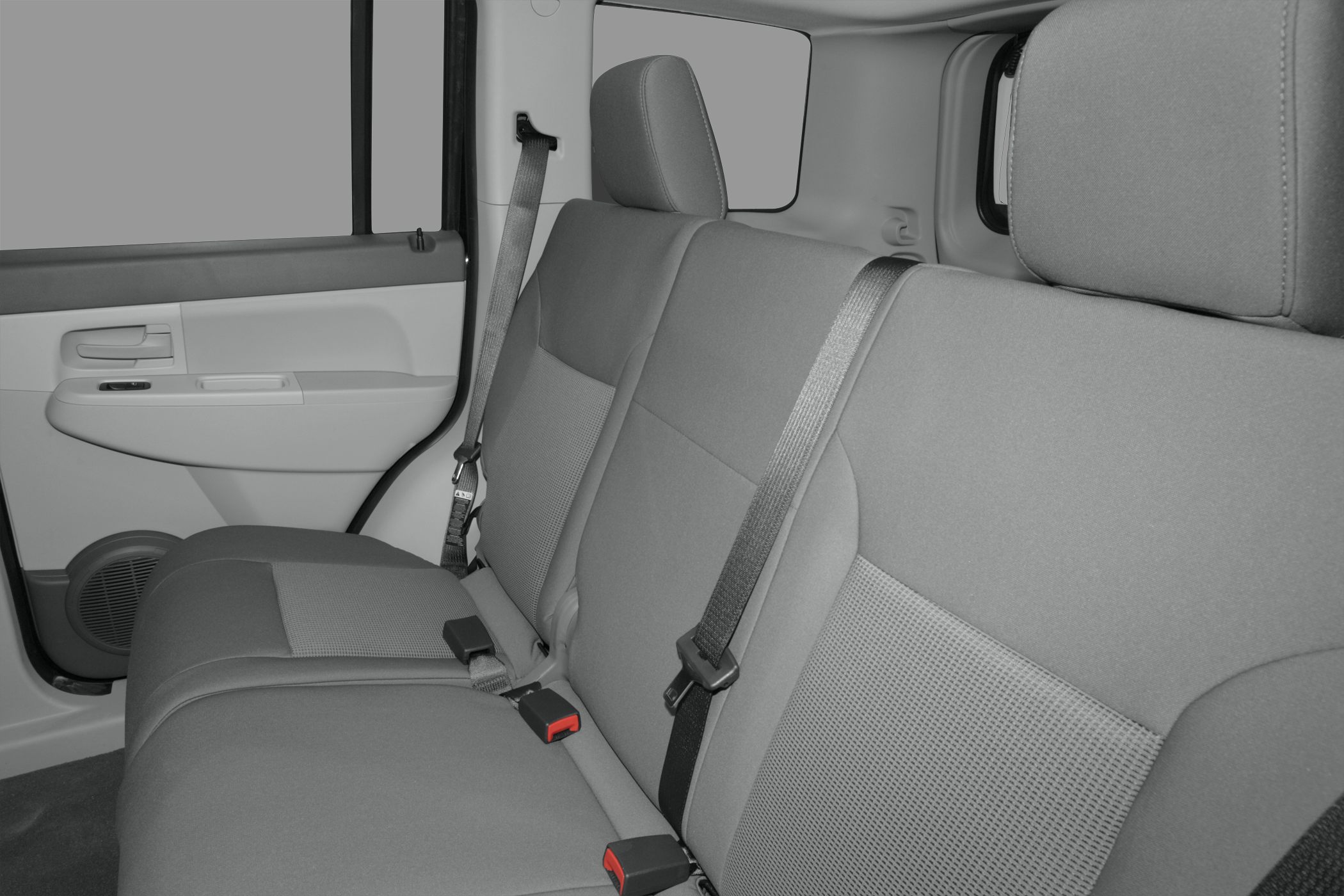 Rear seat with cloth upholstery and seatbelts