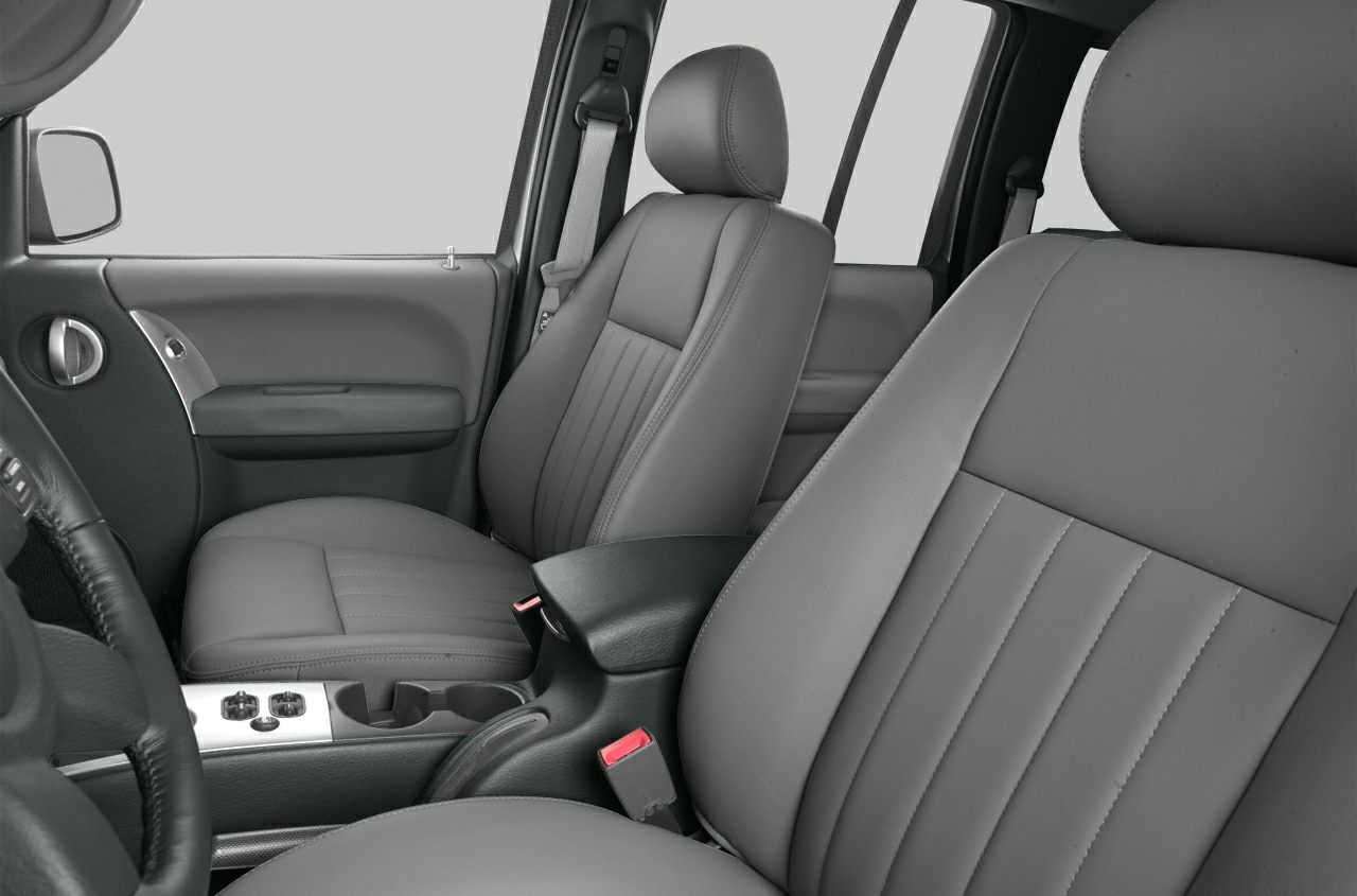 Front leather seats and center console with cup holders