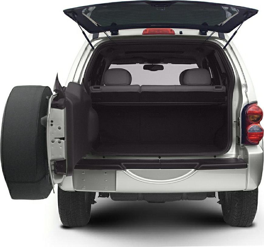Open rear cargo area with dual opening tailgate and spare tire mounted to side.
