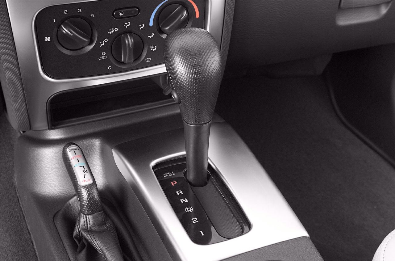 Automatic gear shift lever and climate control dial panel