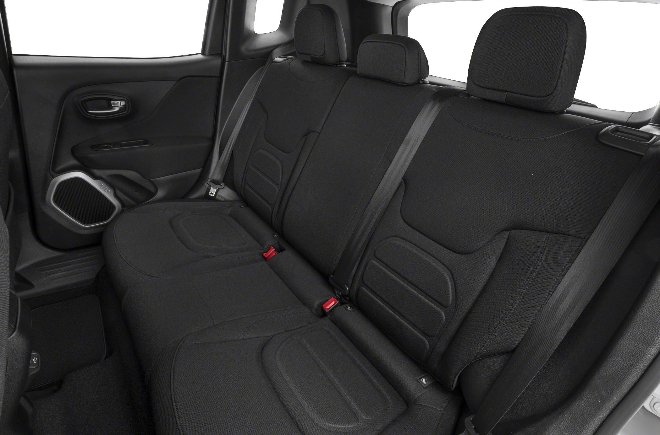 Rear seat interior with black upholstery and seatbelts