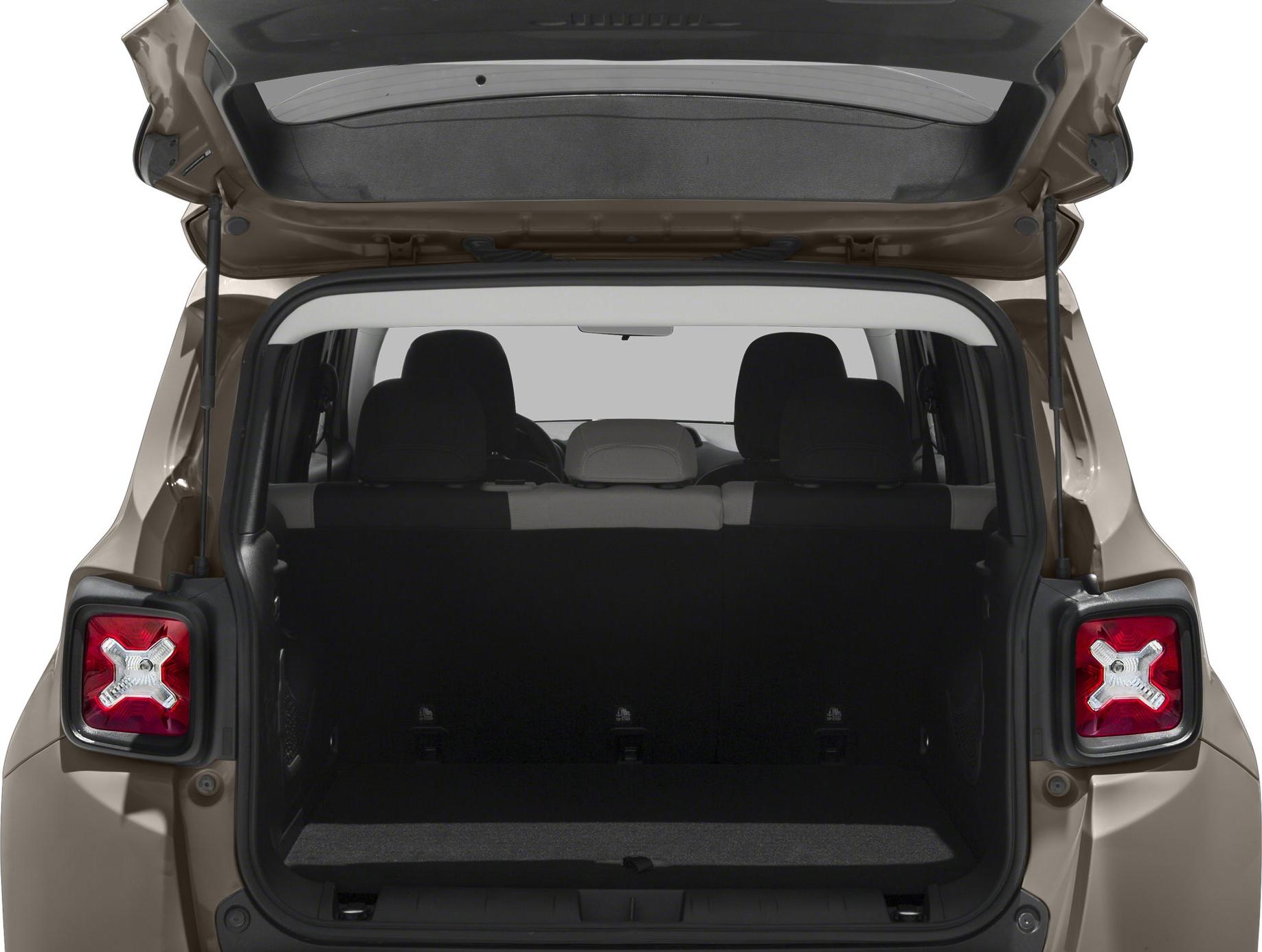 Rear cargo space with open hatch and X-shaped tail lights