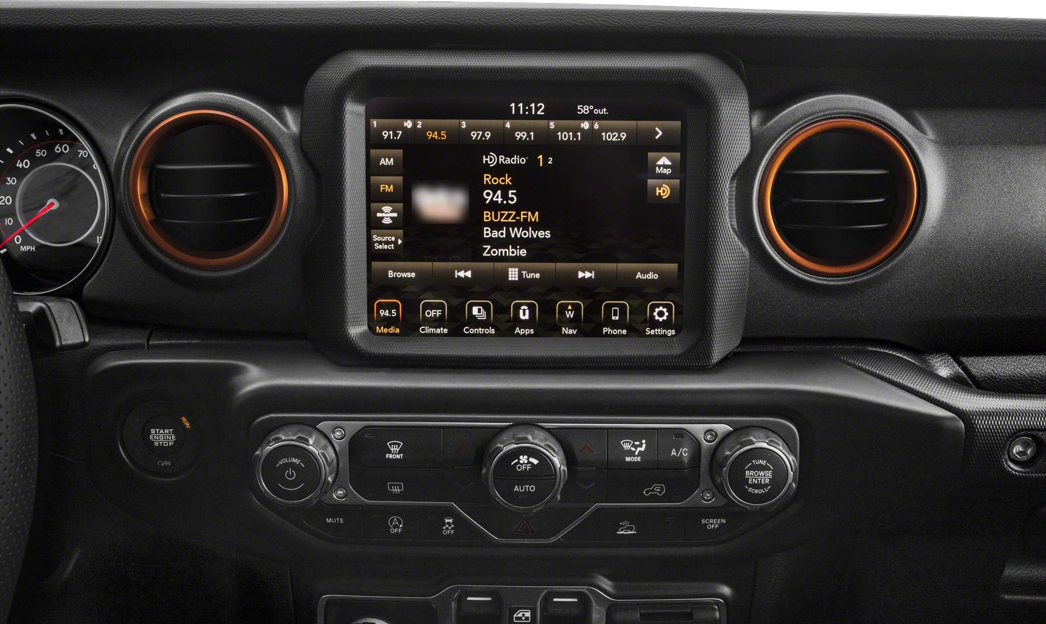 Infotainment touchscreen and climate controls in vehicle dashboard