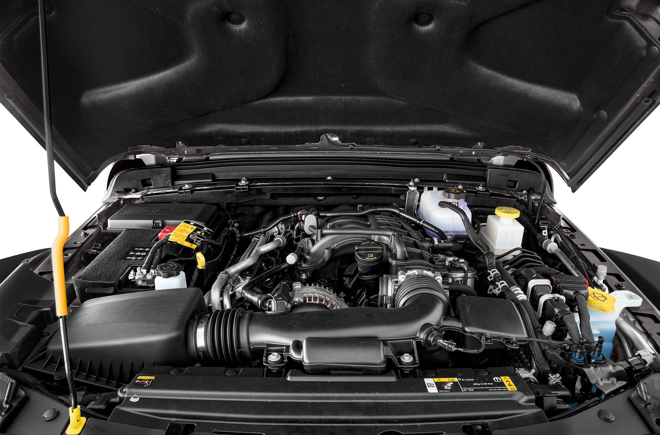 Detailed engine bay with visible components and hood liner