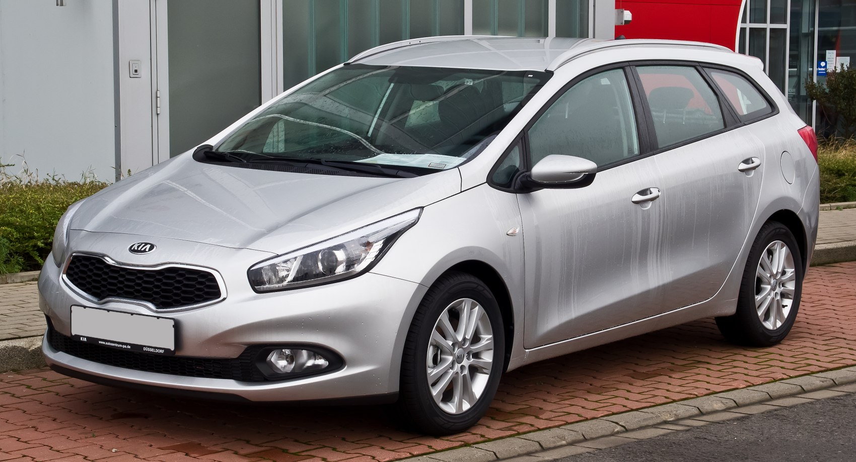 Silver wagon showing front and side profile with grille and alloy wheels