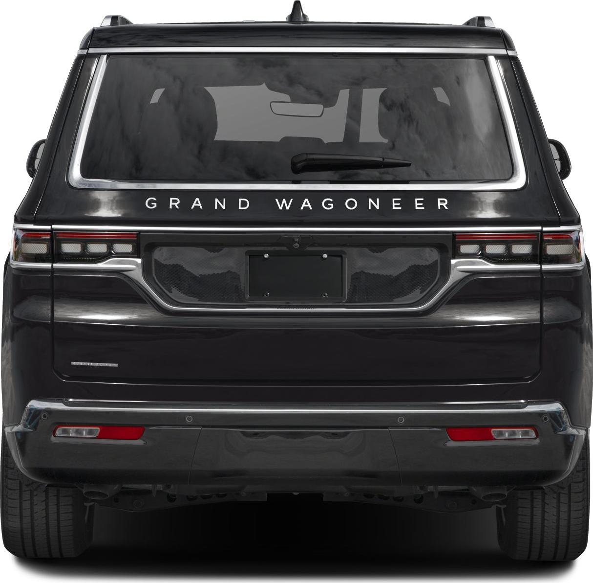 Rear view of a full-size SUV with modern taillights and bold rear styling.