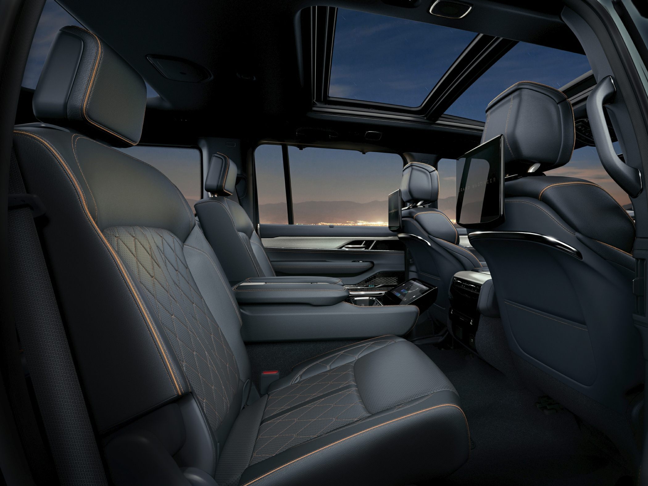 Luxurious leather seats, rear entertainment screens, panoramic sunroof