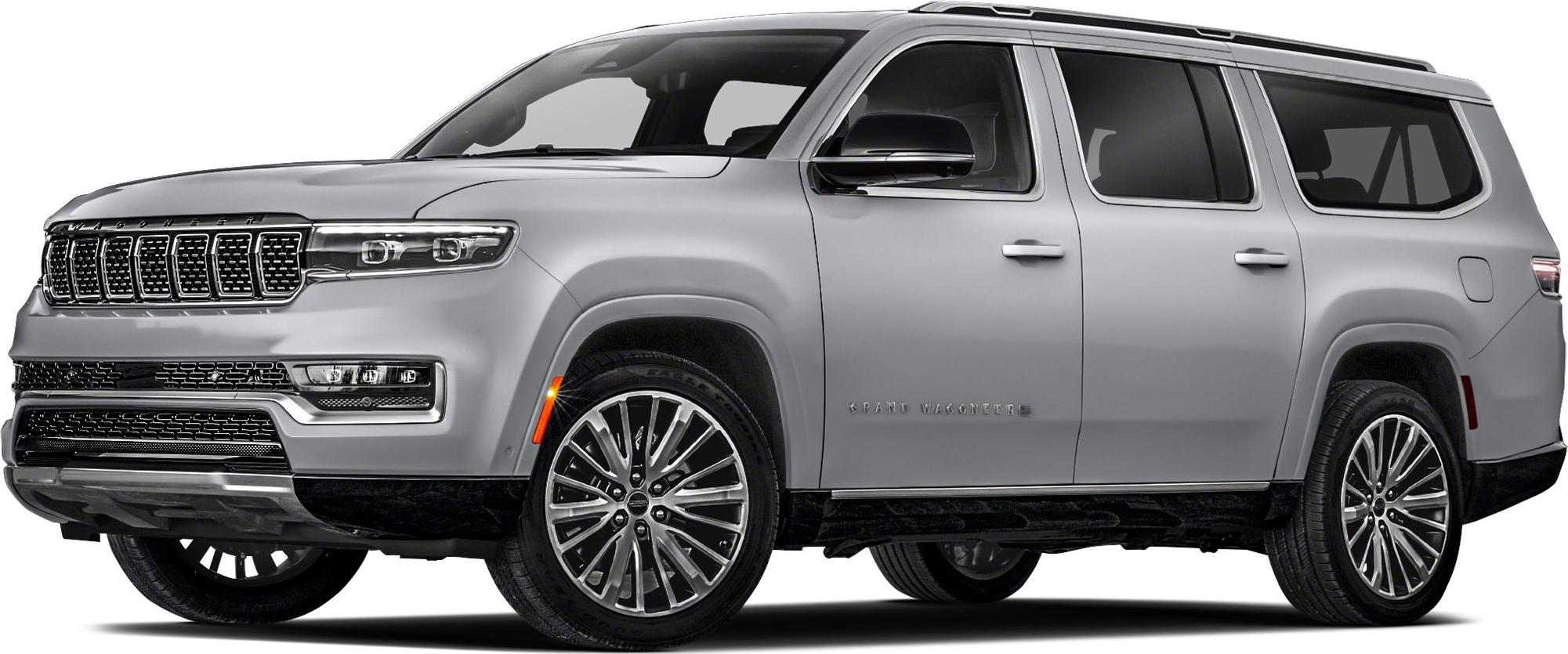 Front-side view with distinctive grille and multi-spoke alloy wheels