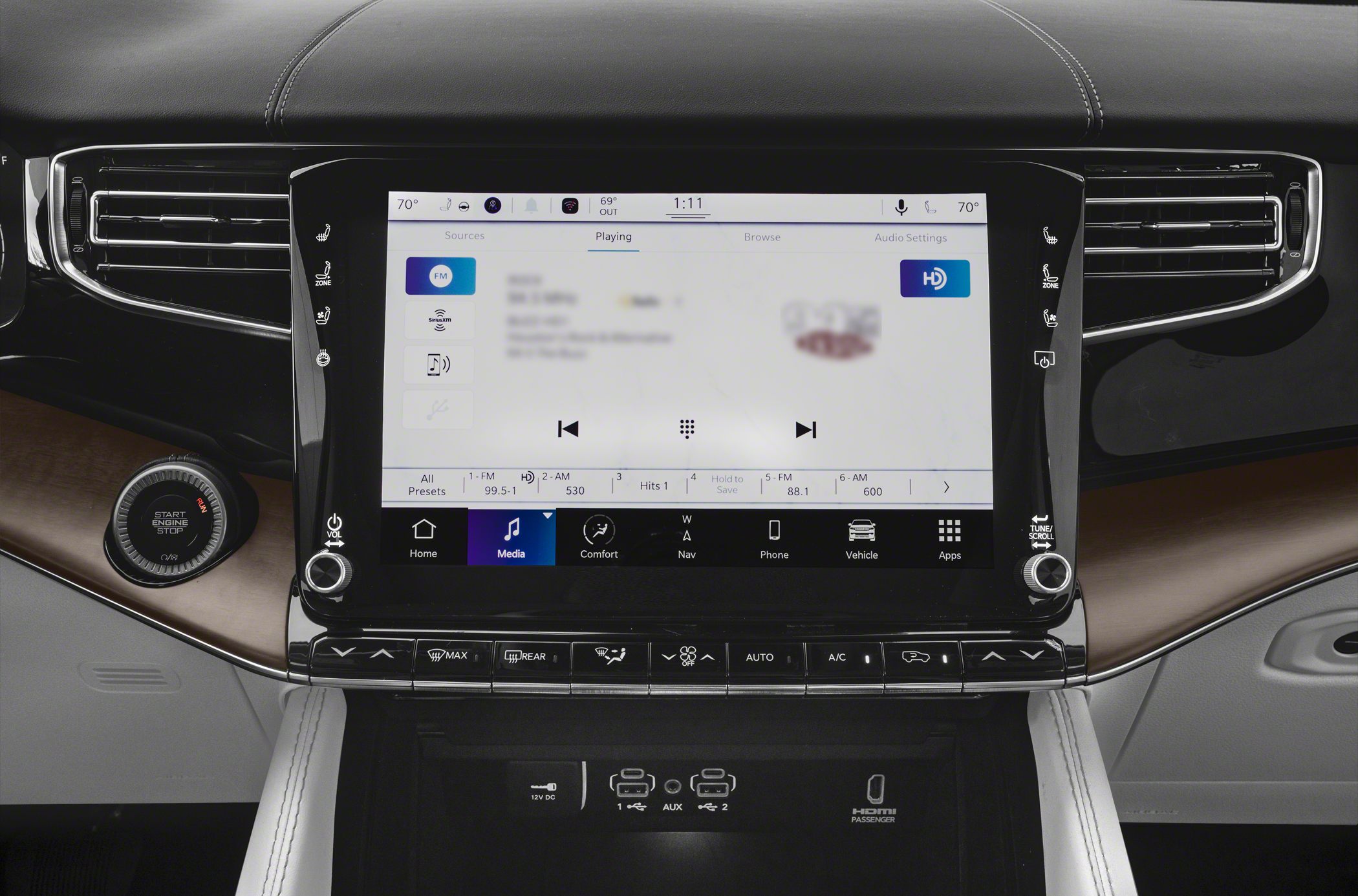 Luxury SUV infotainment touchscreen with climate and media controls