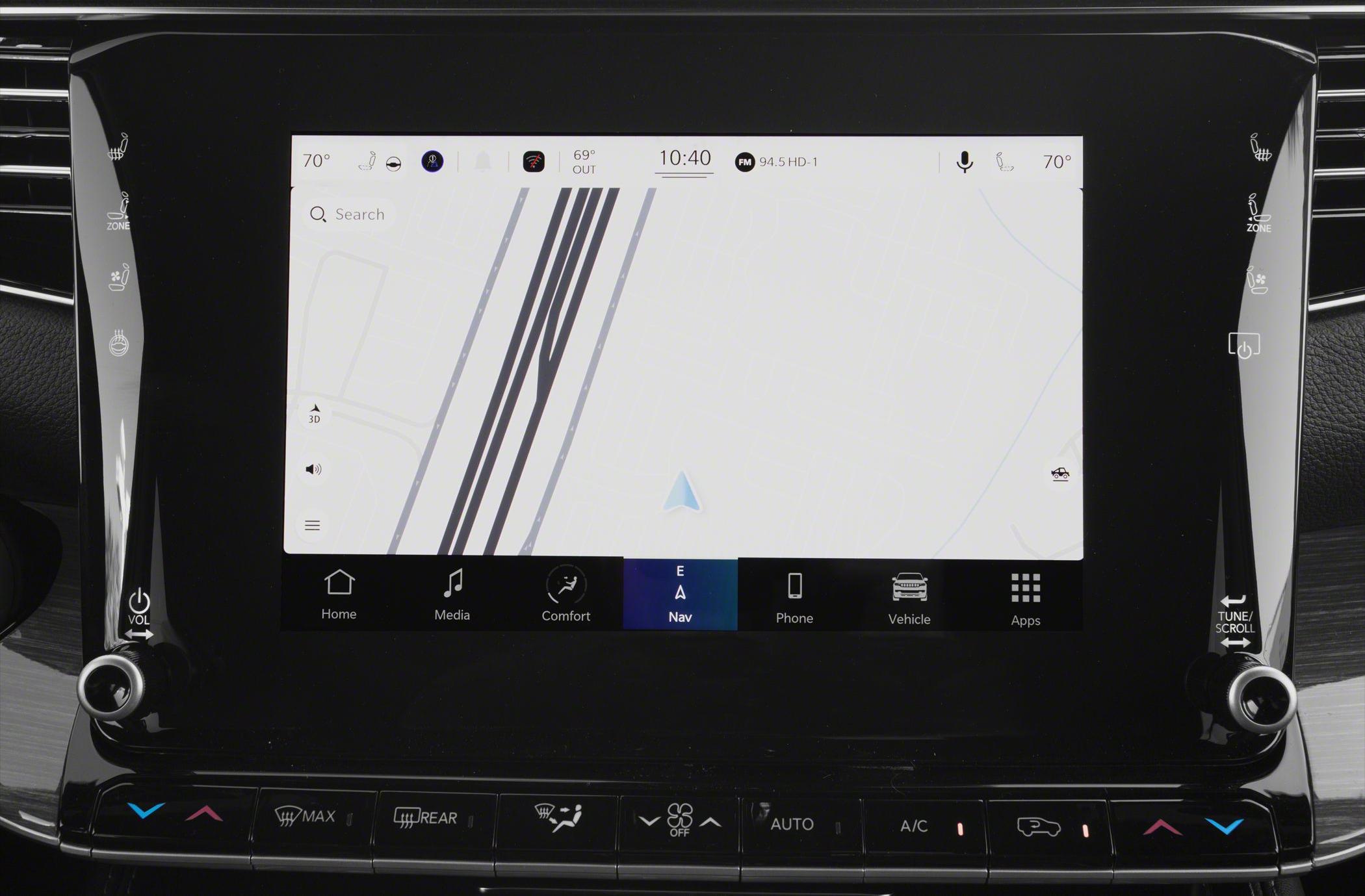 Touchscreen infotainment system with navigation and climate control icons.