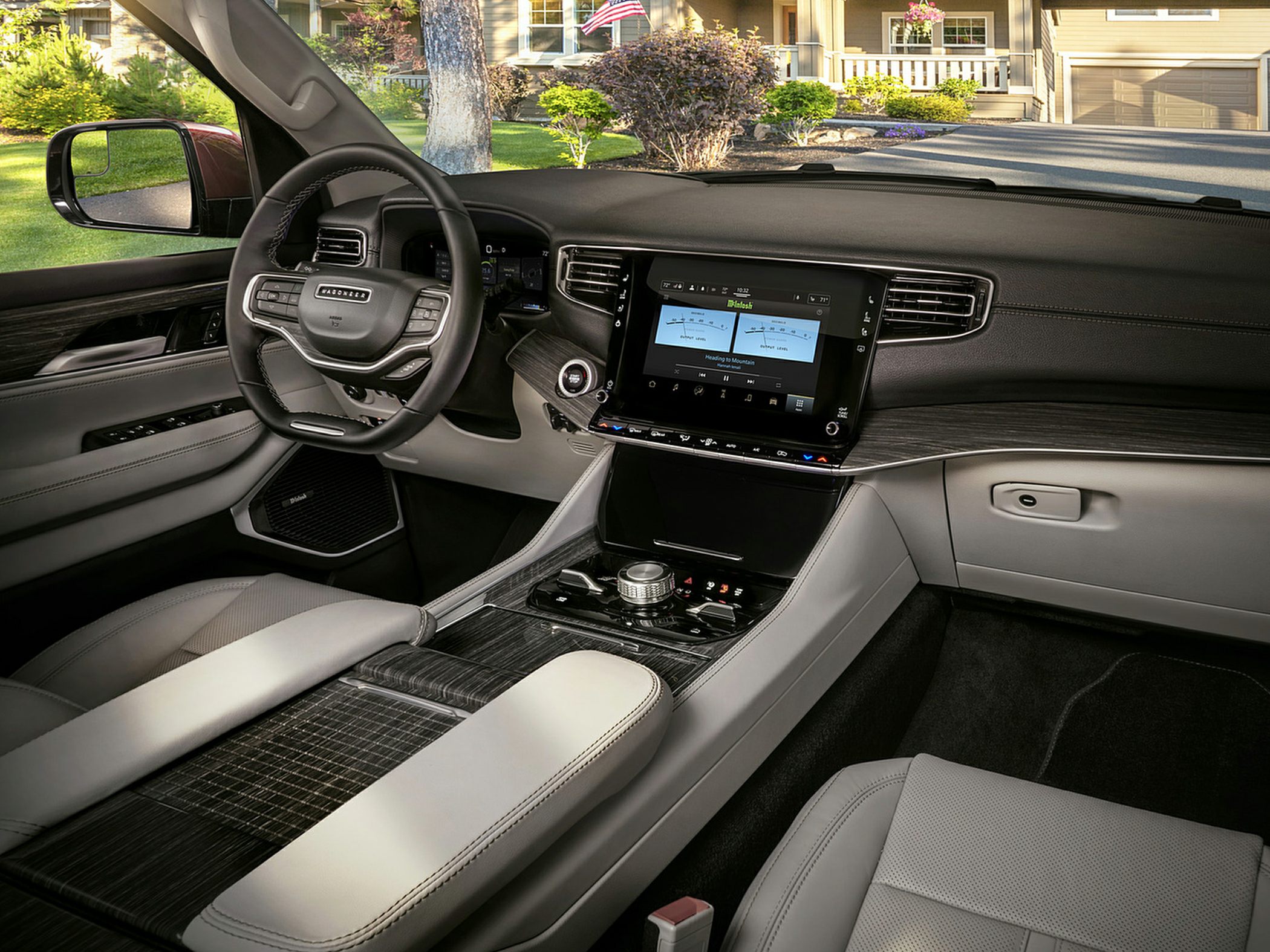 Luxury SUV interior with dashboard and steering wheel