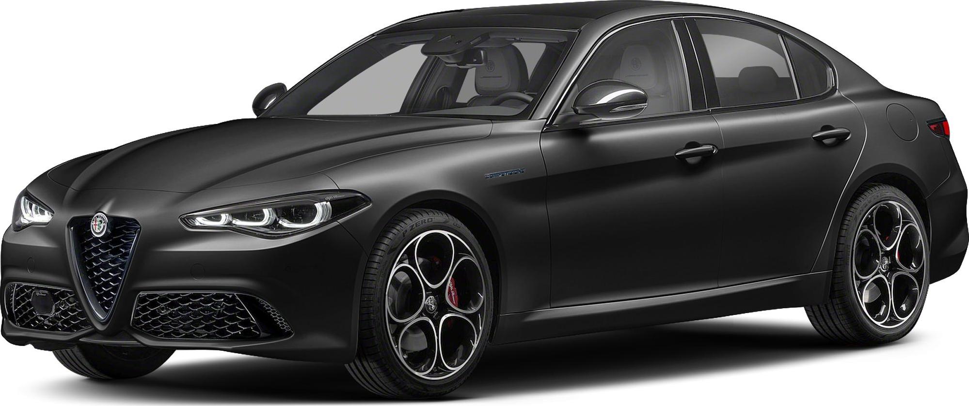 Front-side view of a matte black sedan with aggressive headlights and distinctive grille