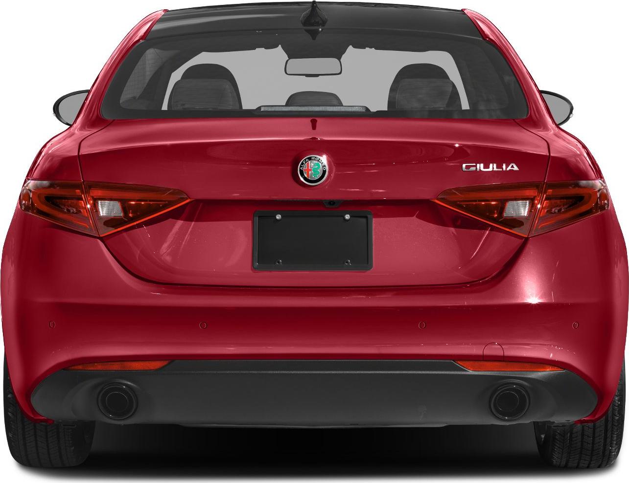 Red rear sedan with dual exhausts and taillights