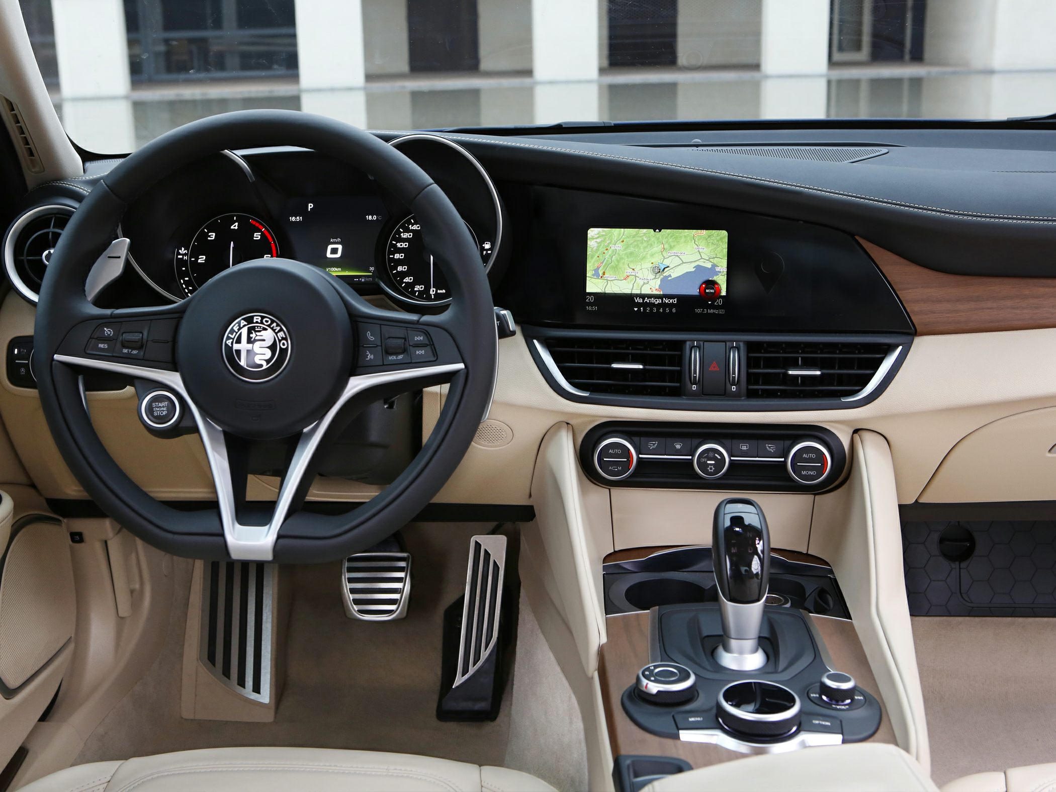 Digital dashboard, modern steering wheel, wood trim interior