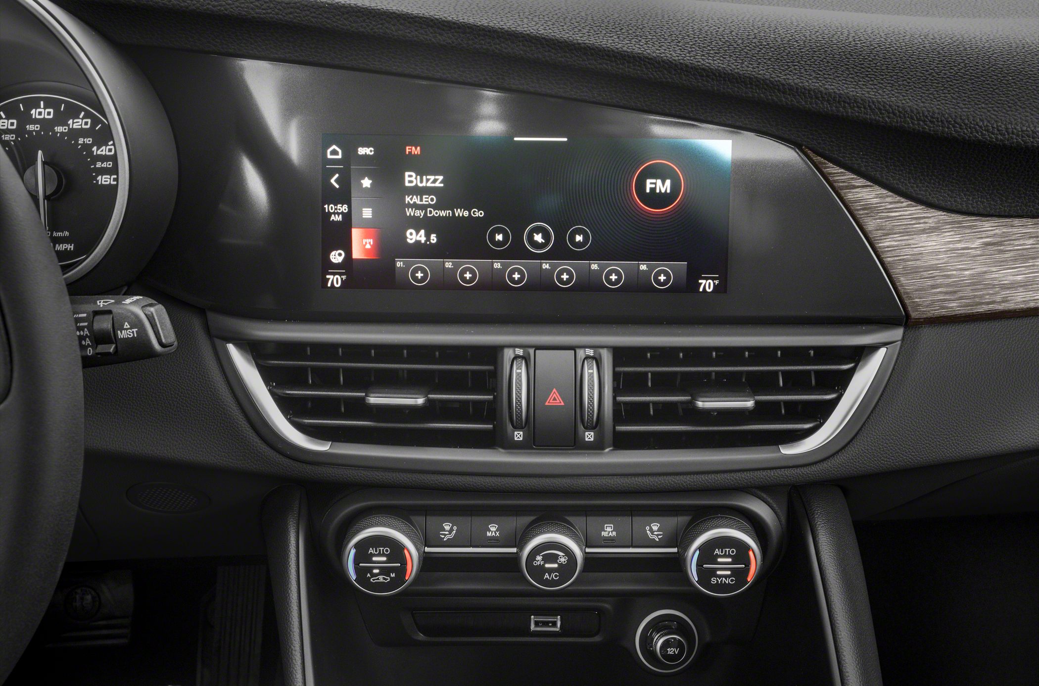 Digital infotainment display and climate control knobs on dashboard