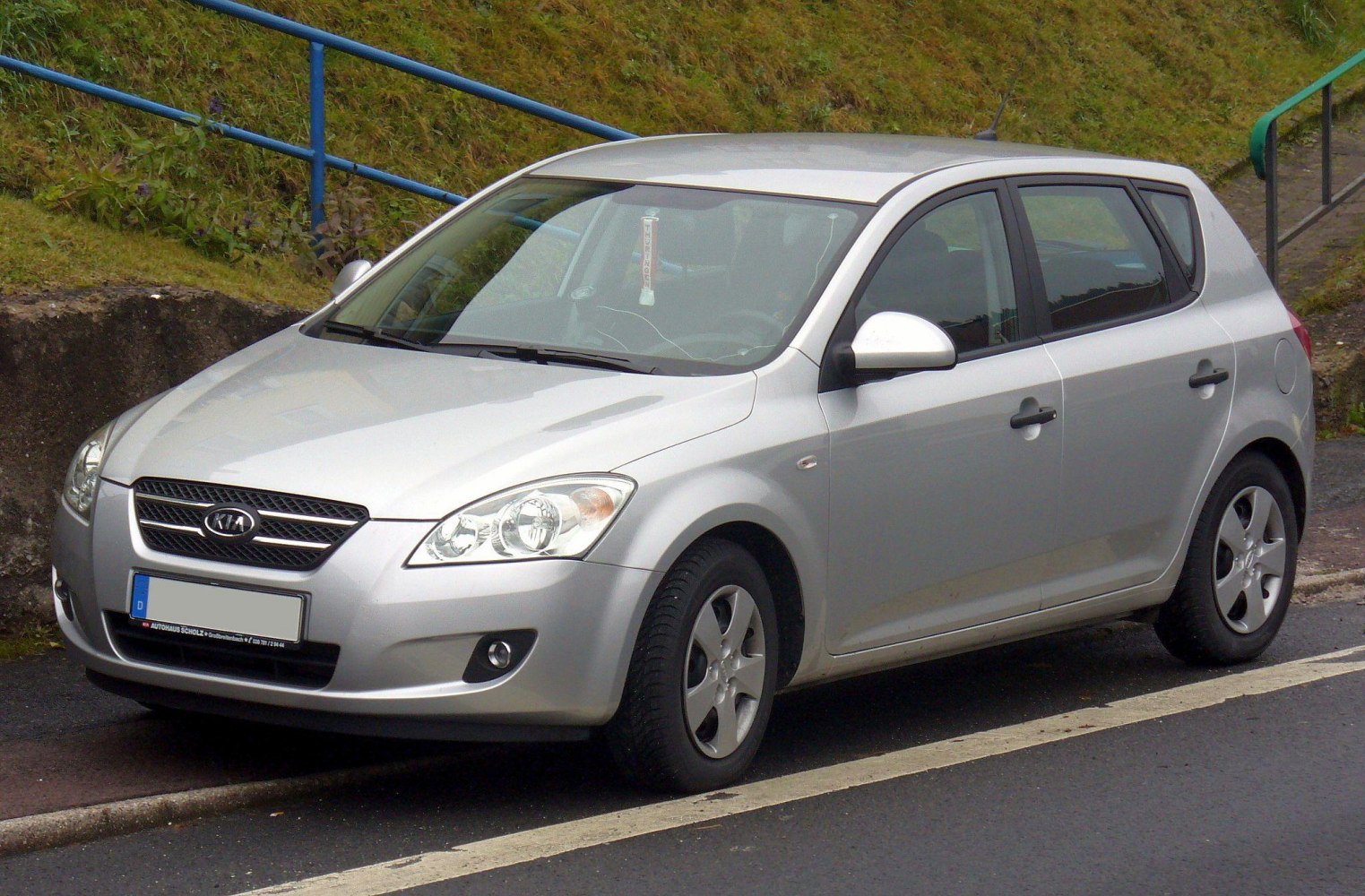 Silver hatchback front and side profile