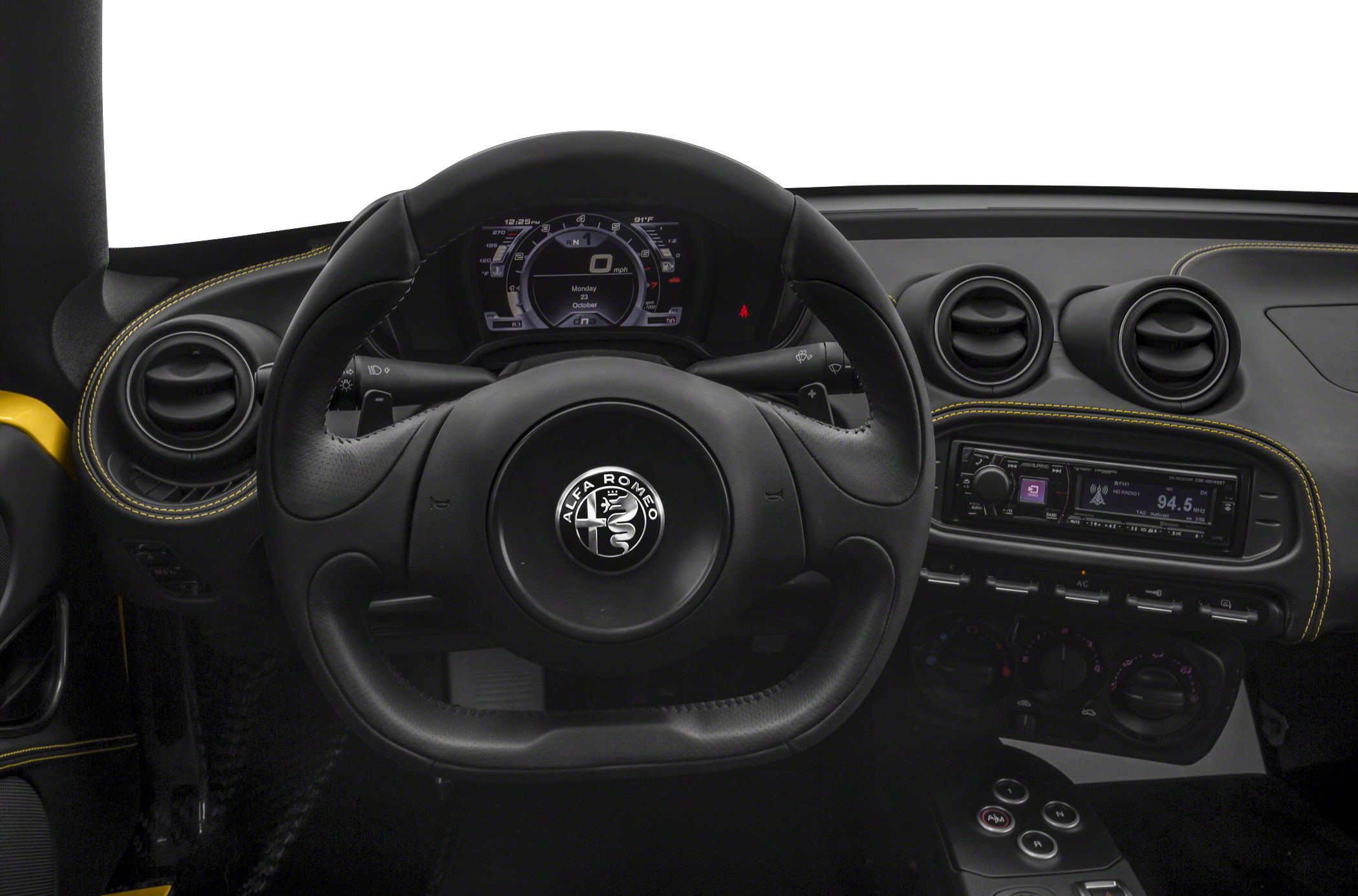 Interior view focusing on dashboard, steering wheel, and digital instrument cluster.
