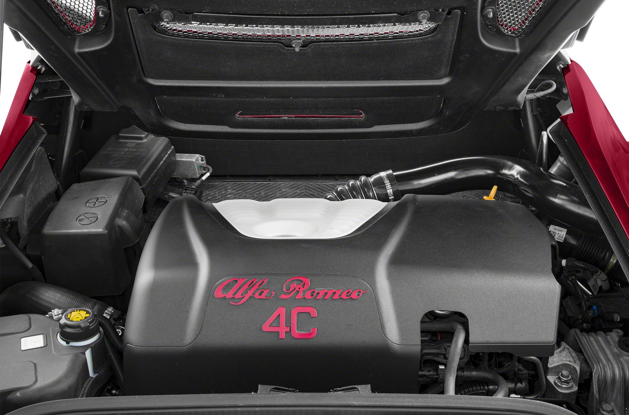 Close-up of Alfa Romeo 4C engine bay with distinctive black engine cover and red lettering