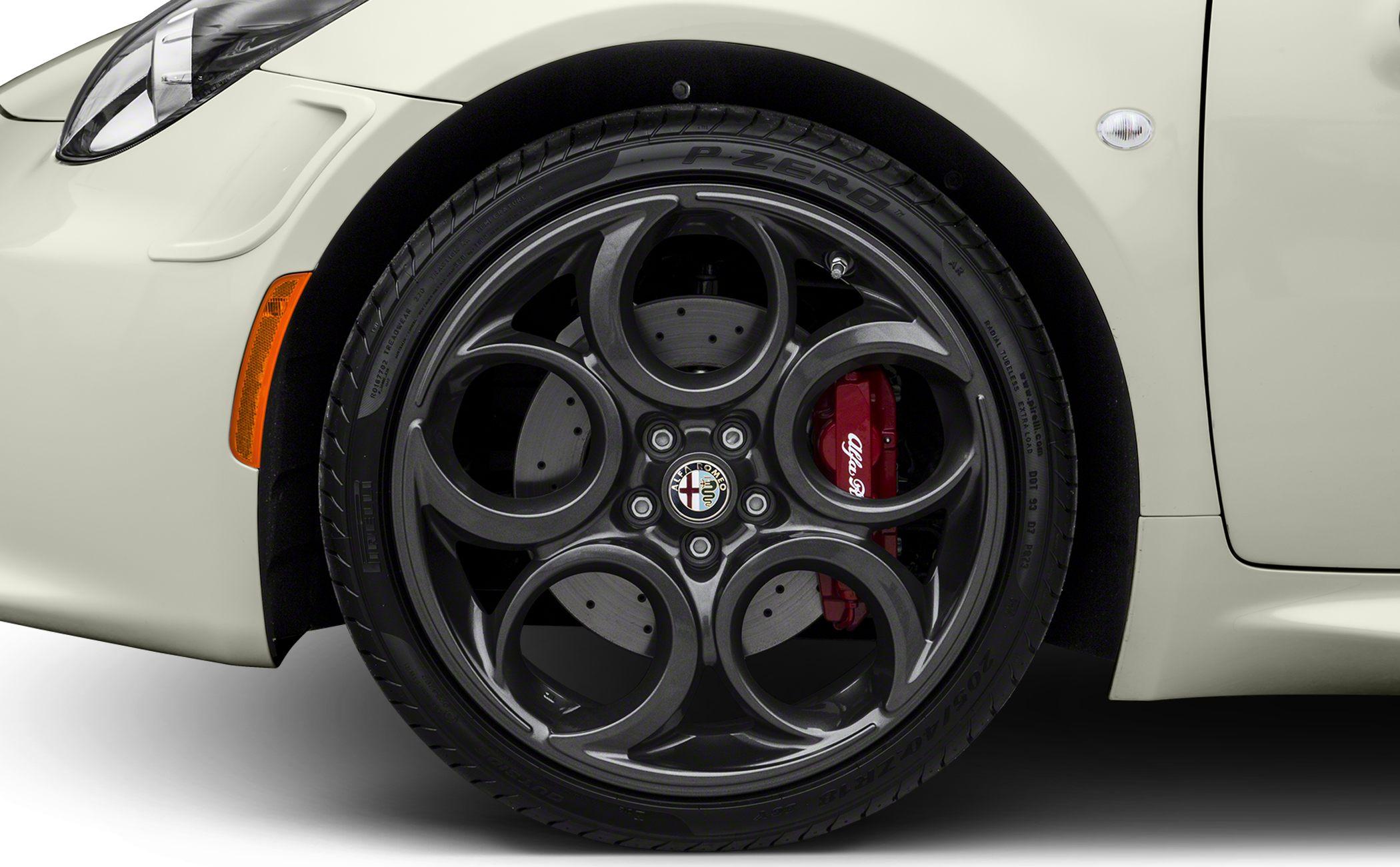 Five-spoke alloy wheel with Pirelli P Zero tire and red brake caliper.