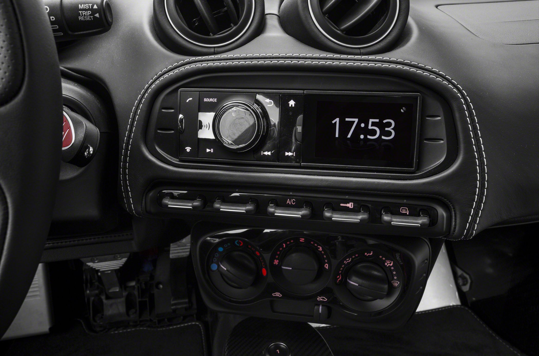Dashboard with infotainment system and climate control dials