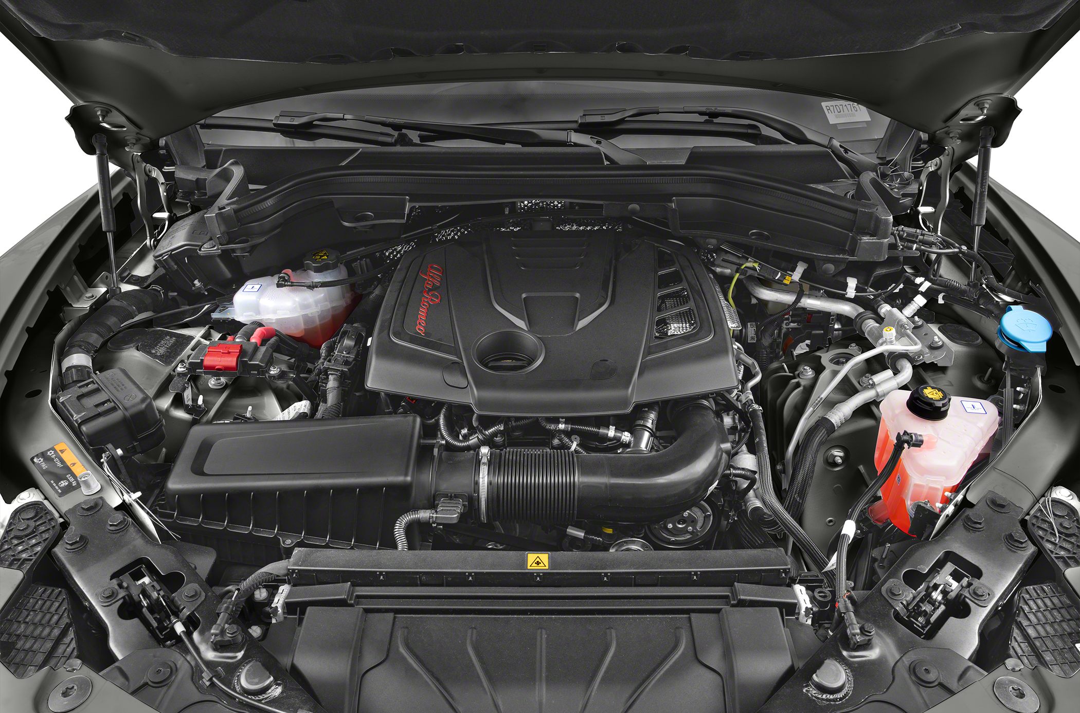 Engine compartment with detailed components and Alfa Romeo branding