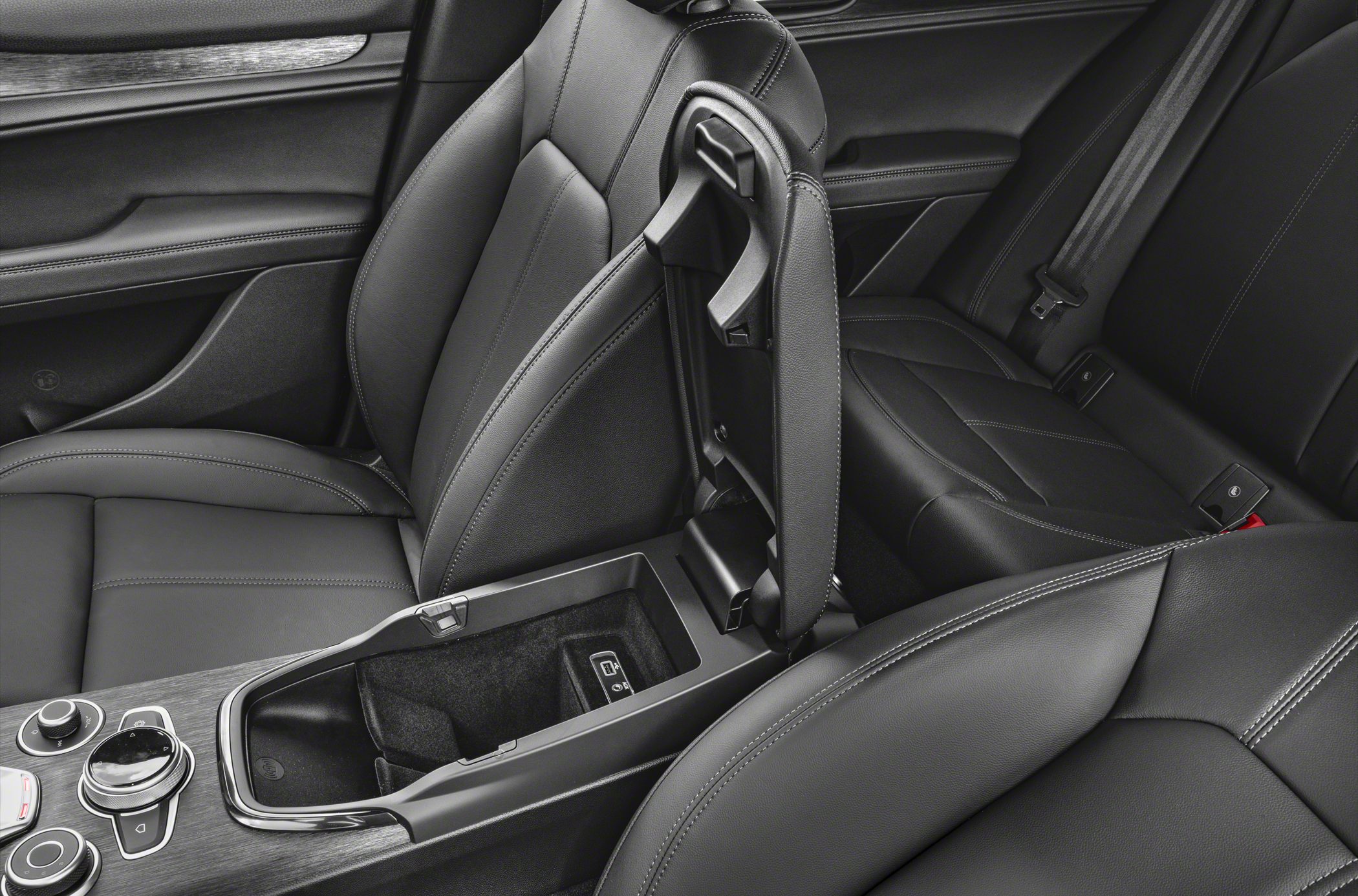 Black leather seats with open center console storage