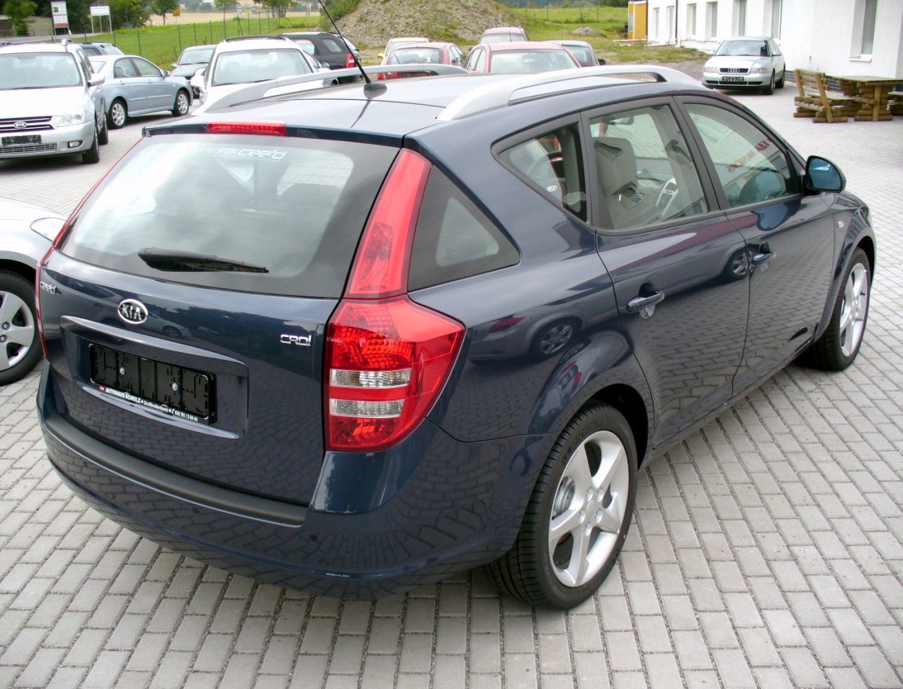 Rear and side profile with taillights and roof rails