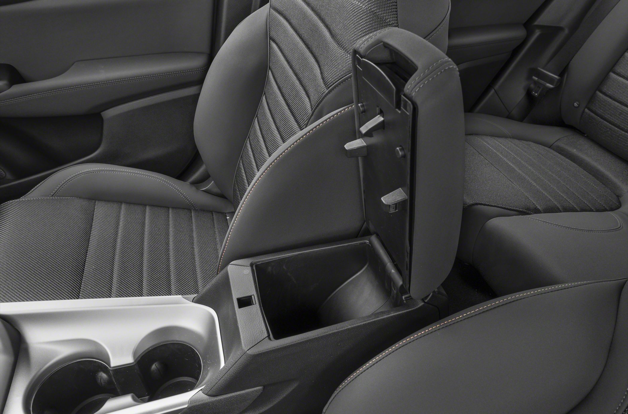 Center console storage compartment and dual cup holders in car interior