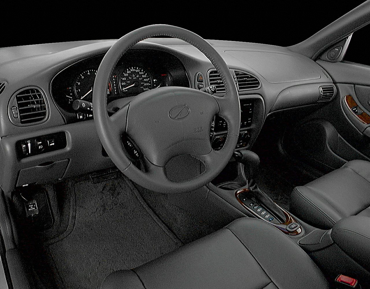 Steering wheel, dashboard, and center console in car interior