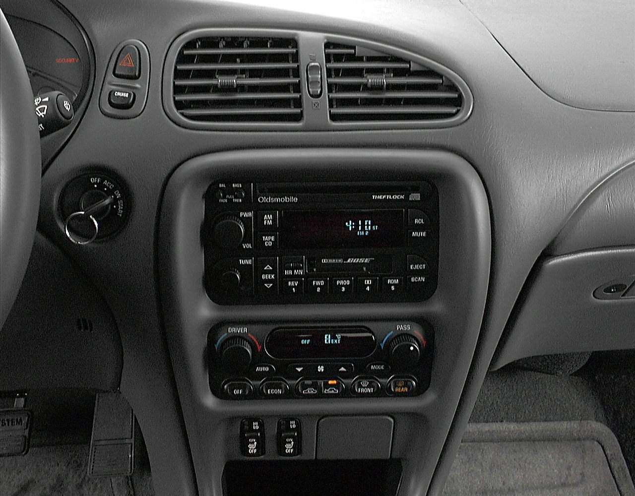 Dashboard radio, climate controls, and air vents close-up