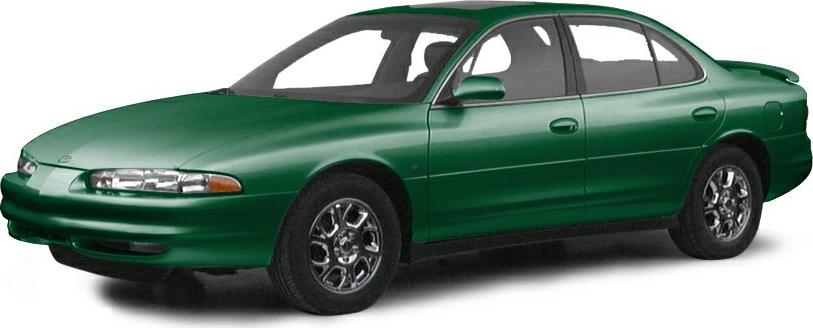 Green four-door sedan with alloy wheels in a front side view.
