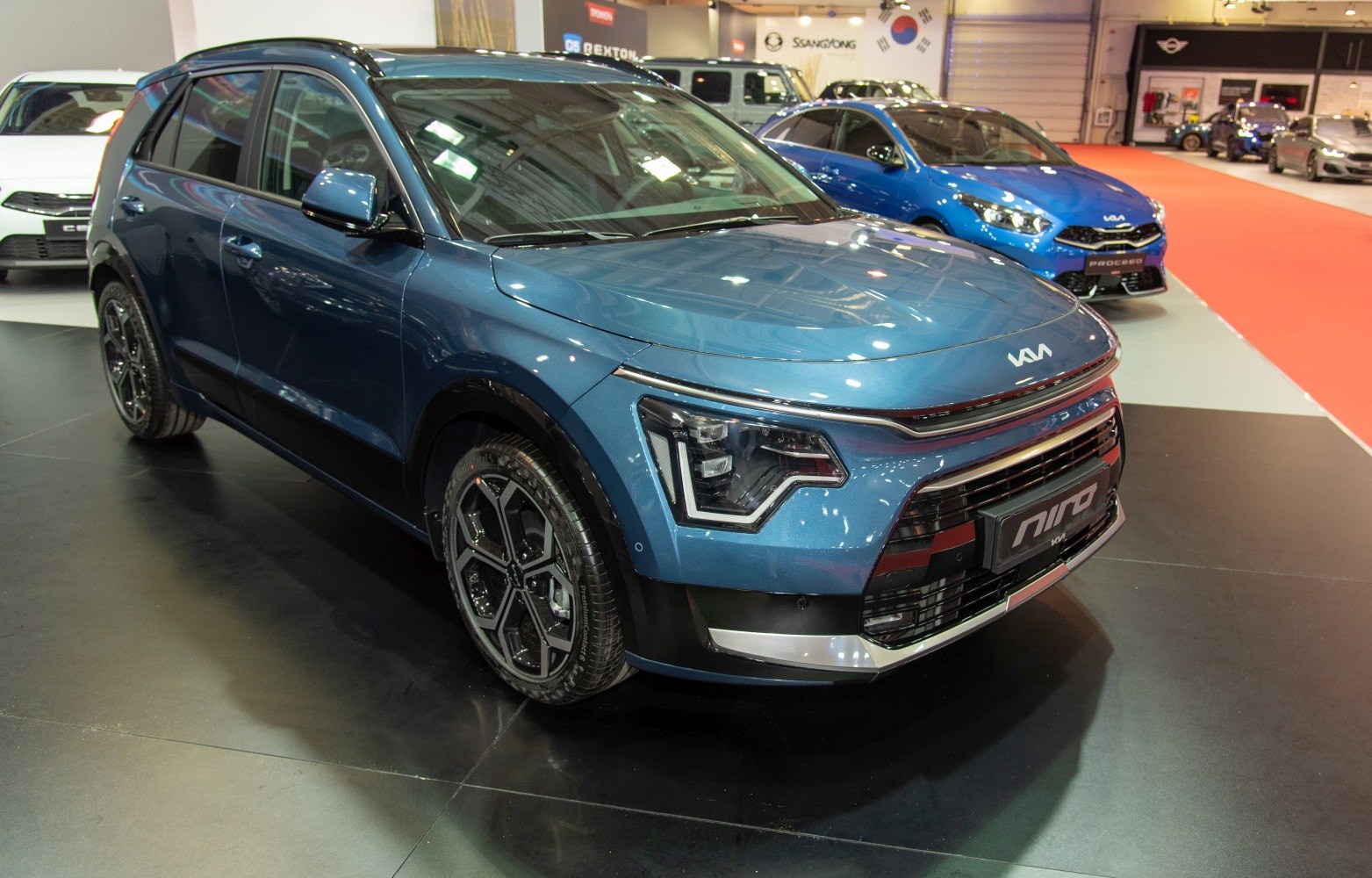 Front and side view of compact SUV with LED headlights and alloy wheels