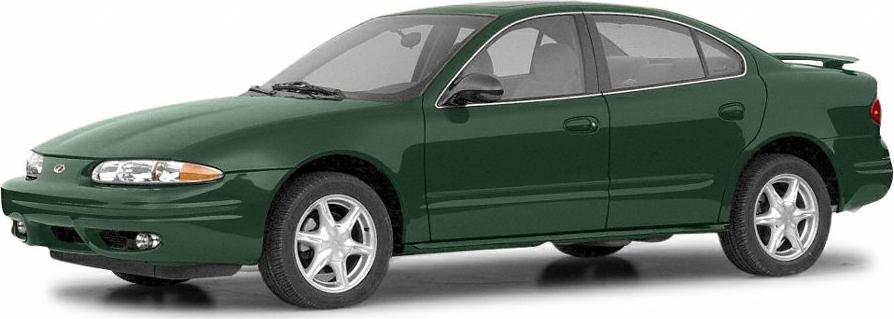 Dark green four-door sedan with rear spoiler and alloy wheels
