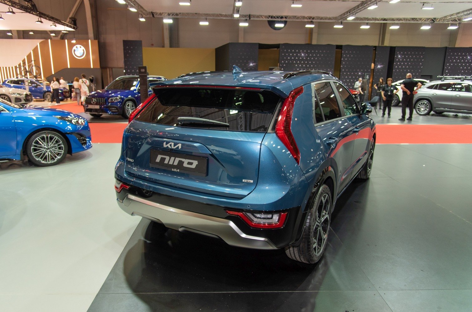 Rear view with distinctive vertical tail lights and roof spoiler