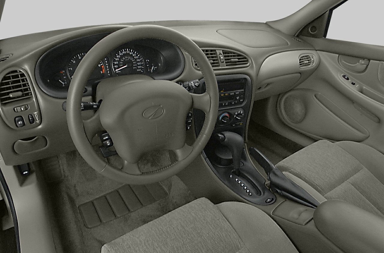 Dashboard, steering wheel, and center console with gear selector