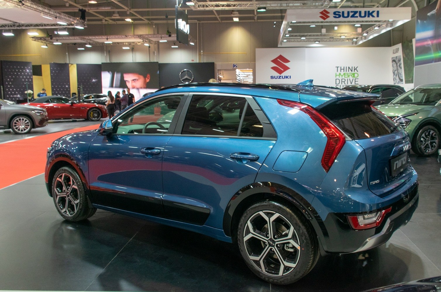 Side rear view of hatchback with vertical LED tail lights and sporty alloy wheels