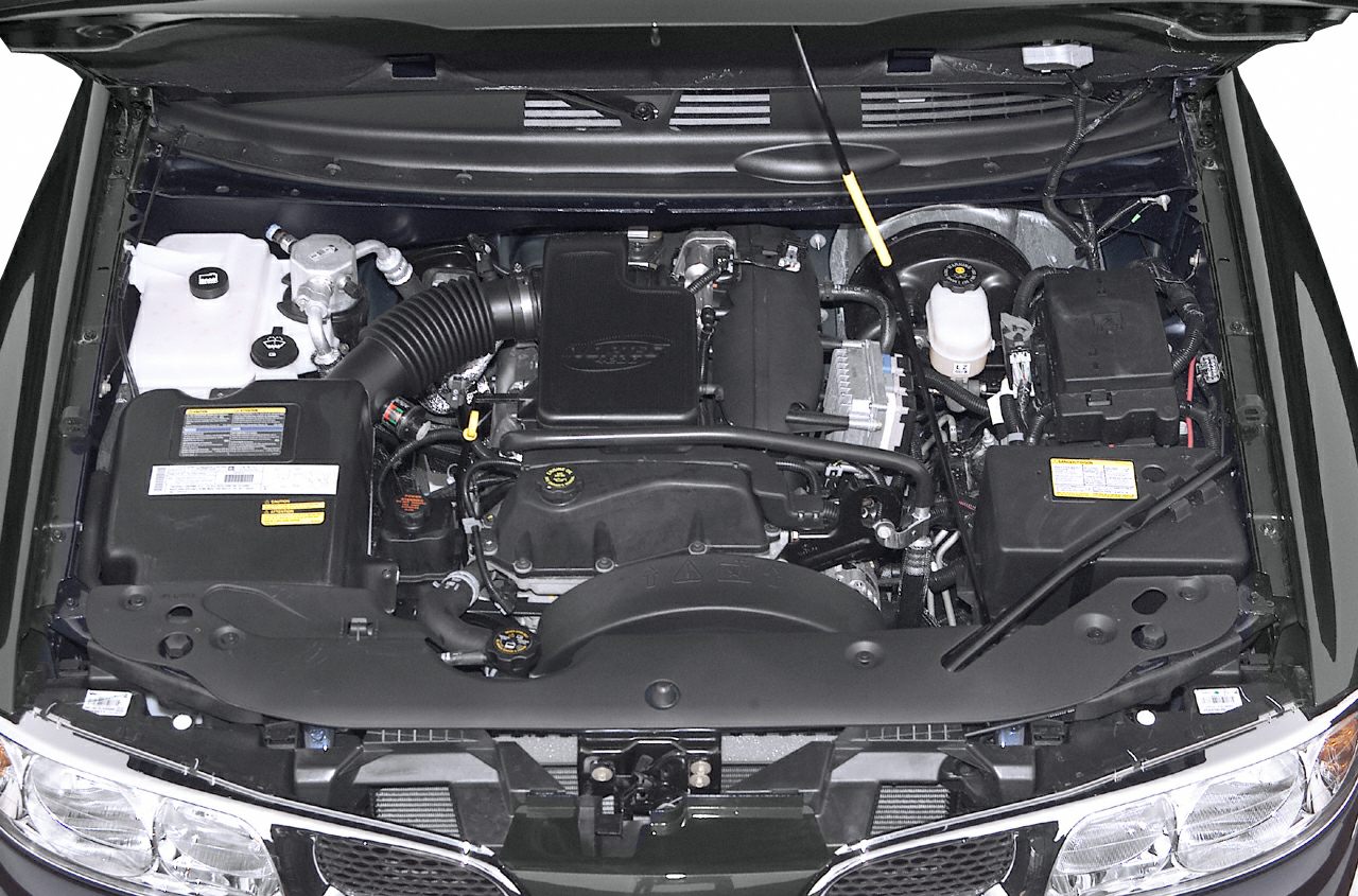 Open engine bay showing detailed engine layout and components.