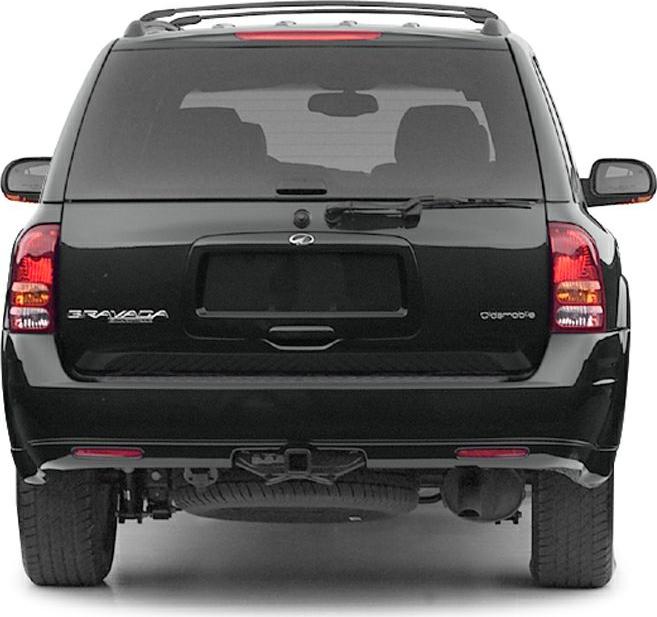 Rear view of black SUV showing taillights, rear window, bumper, and spare tire underneath