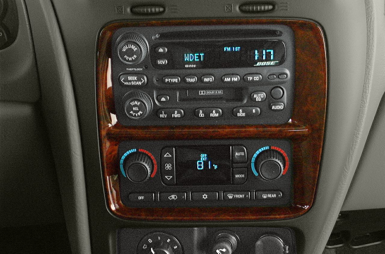 Radio and climate control panel with digital display and Bose audio system