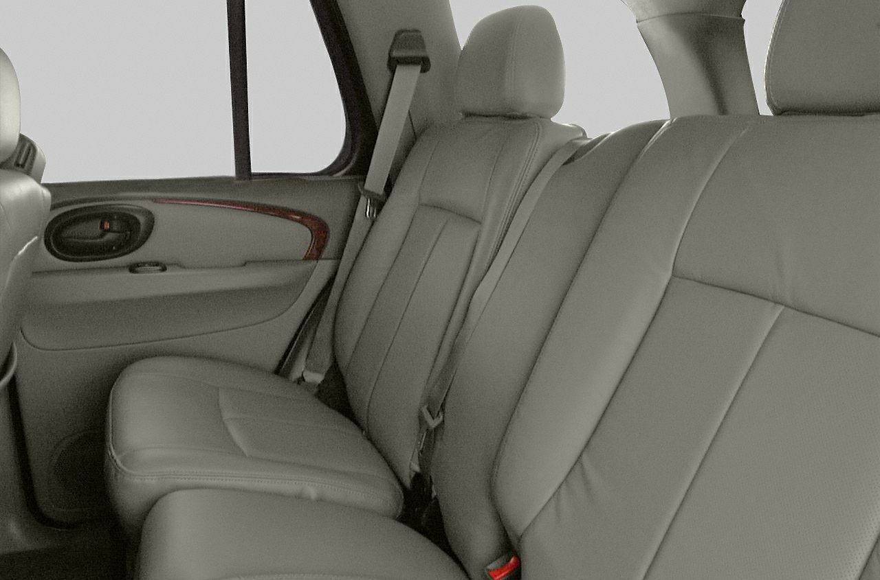 Leather rear seating with seat belts and door panel trim