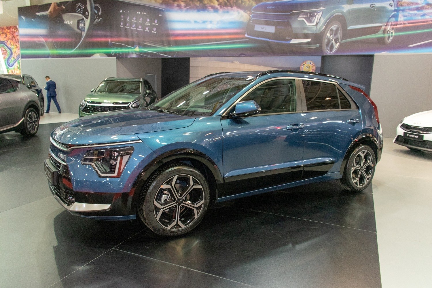 Blue exterior with distinctive front LED headlights and modern alloy wheels