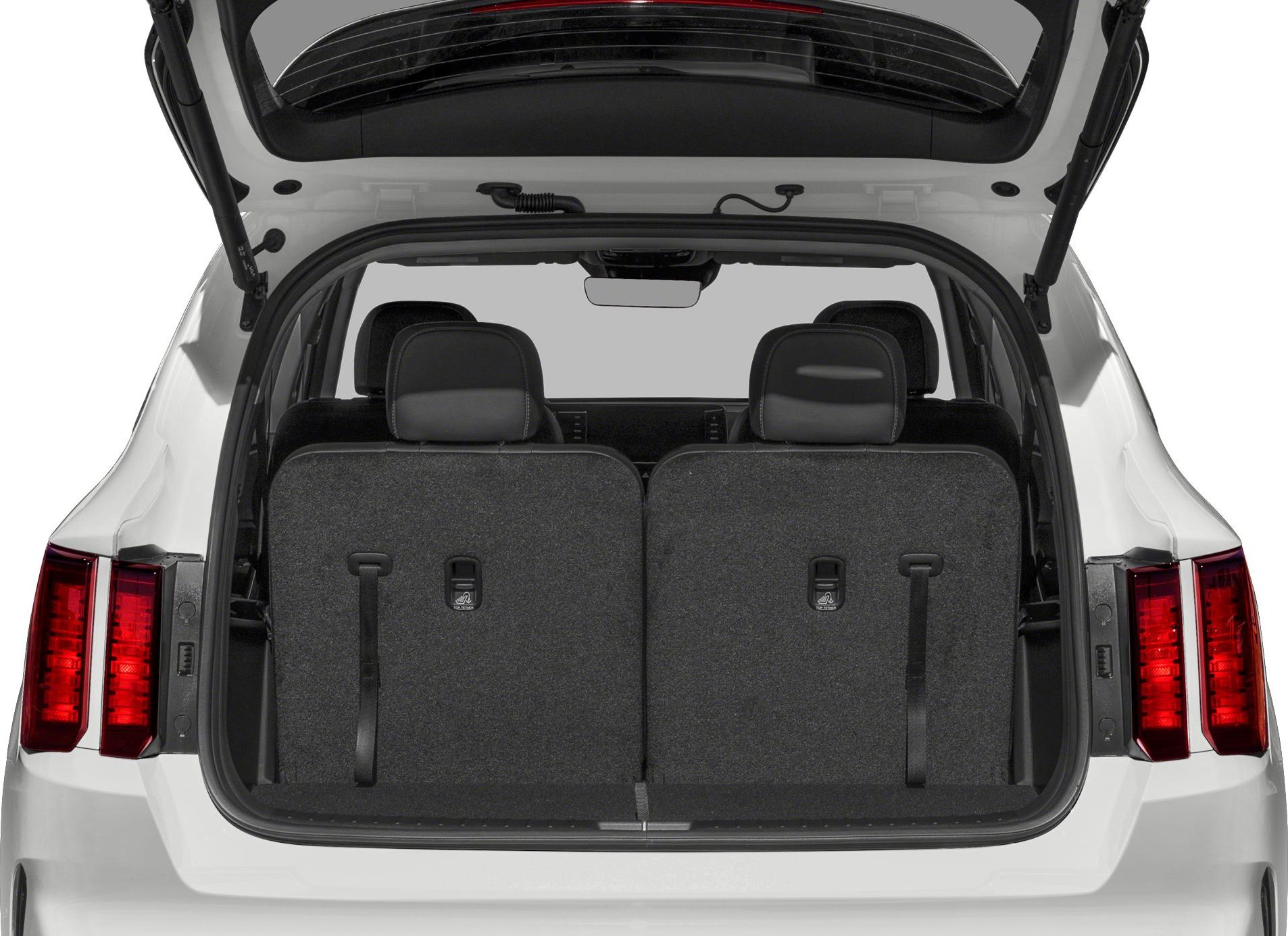 Spacious rear cargo area with foldable third-row seats and tailgate open