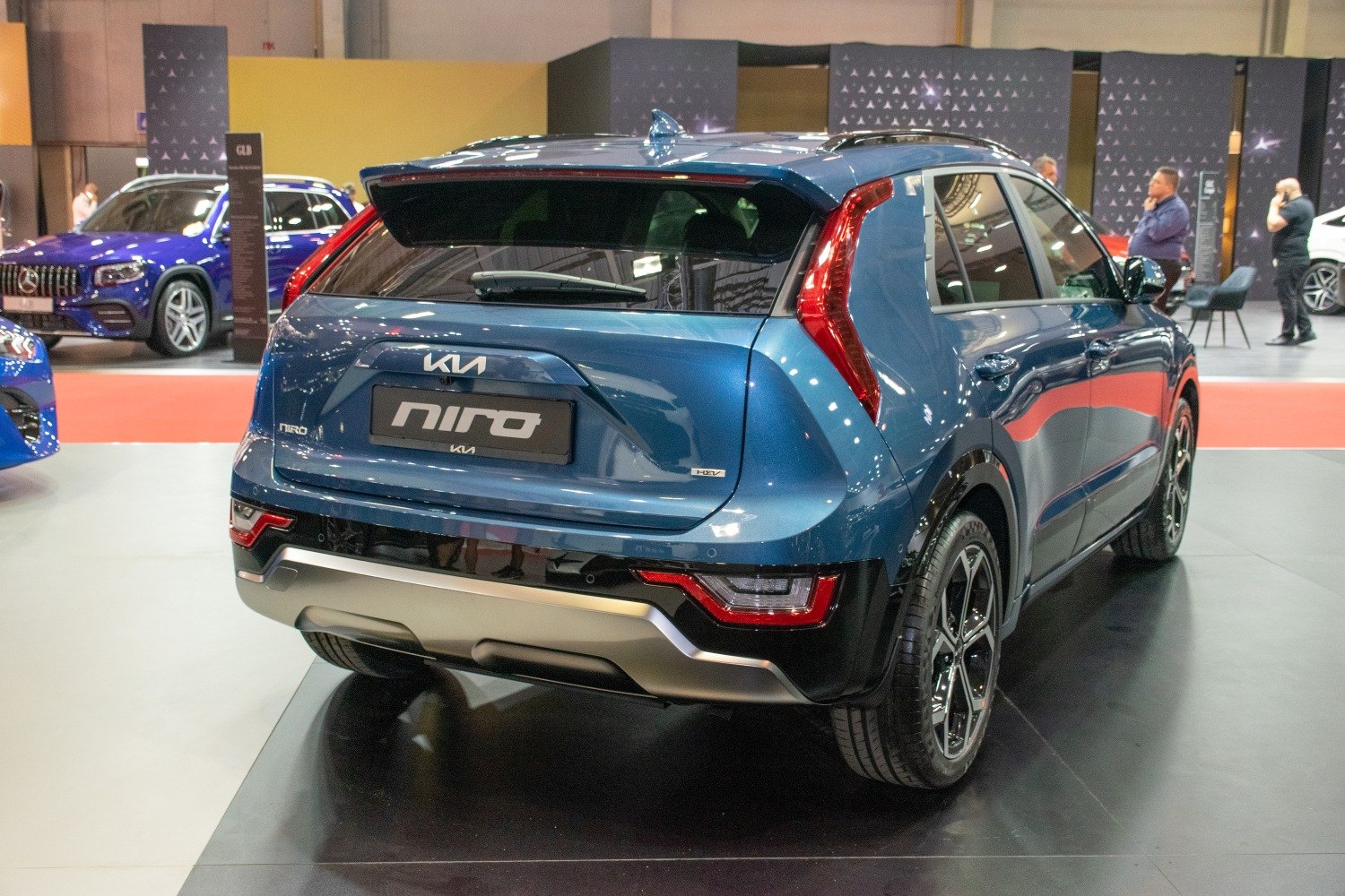 Rear view with distinctive vertical taillights and HEV badge