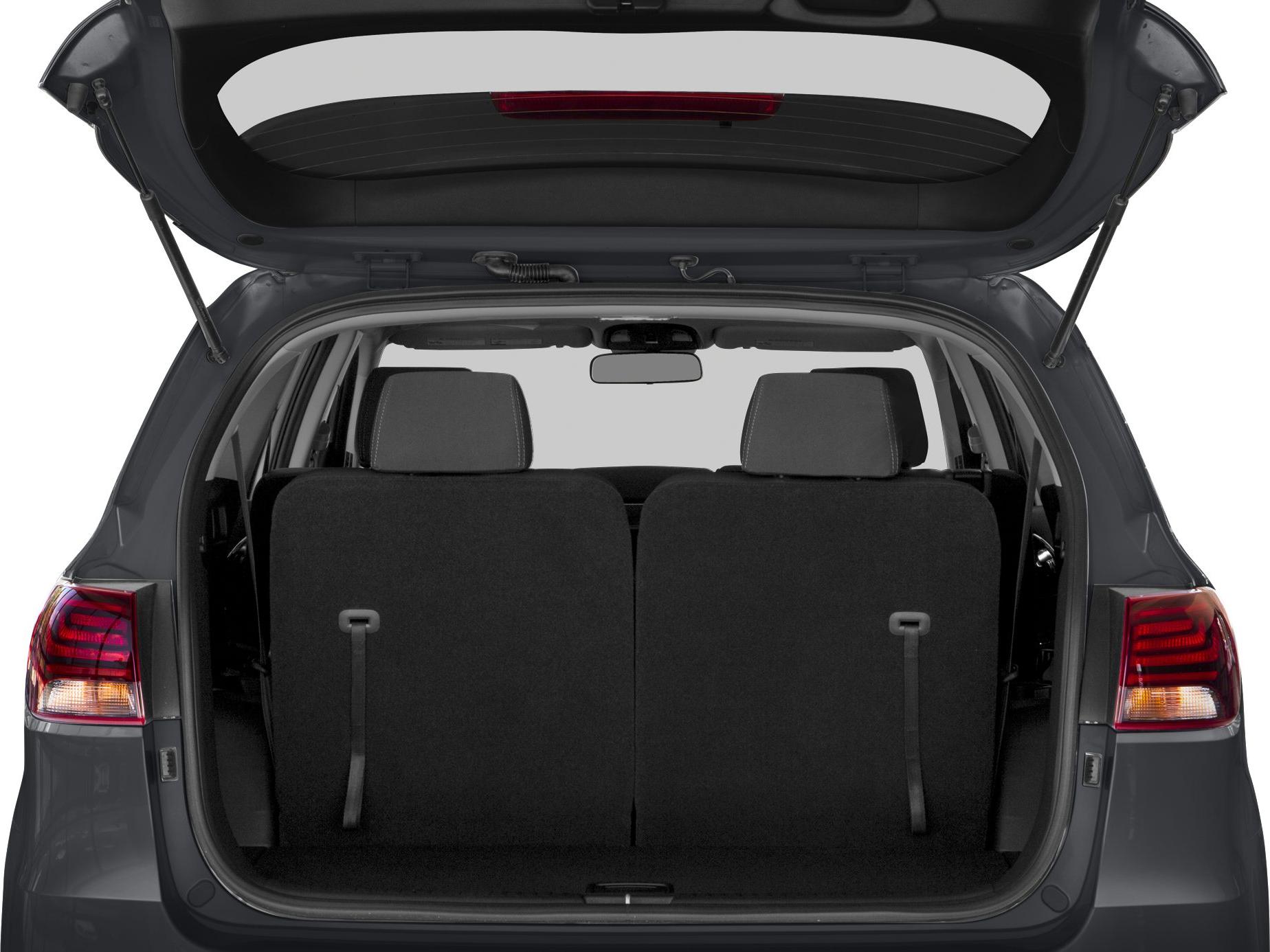 Open SUV rear hatch with two upright rear seats and visible taillights