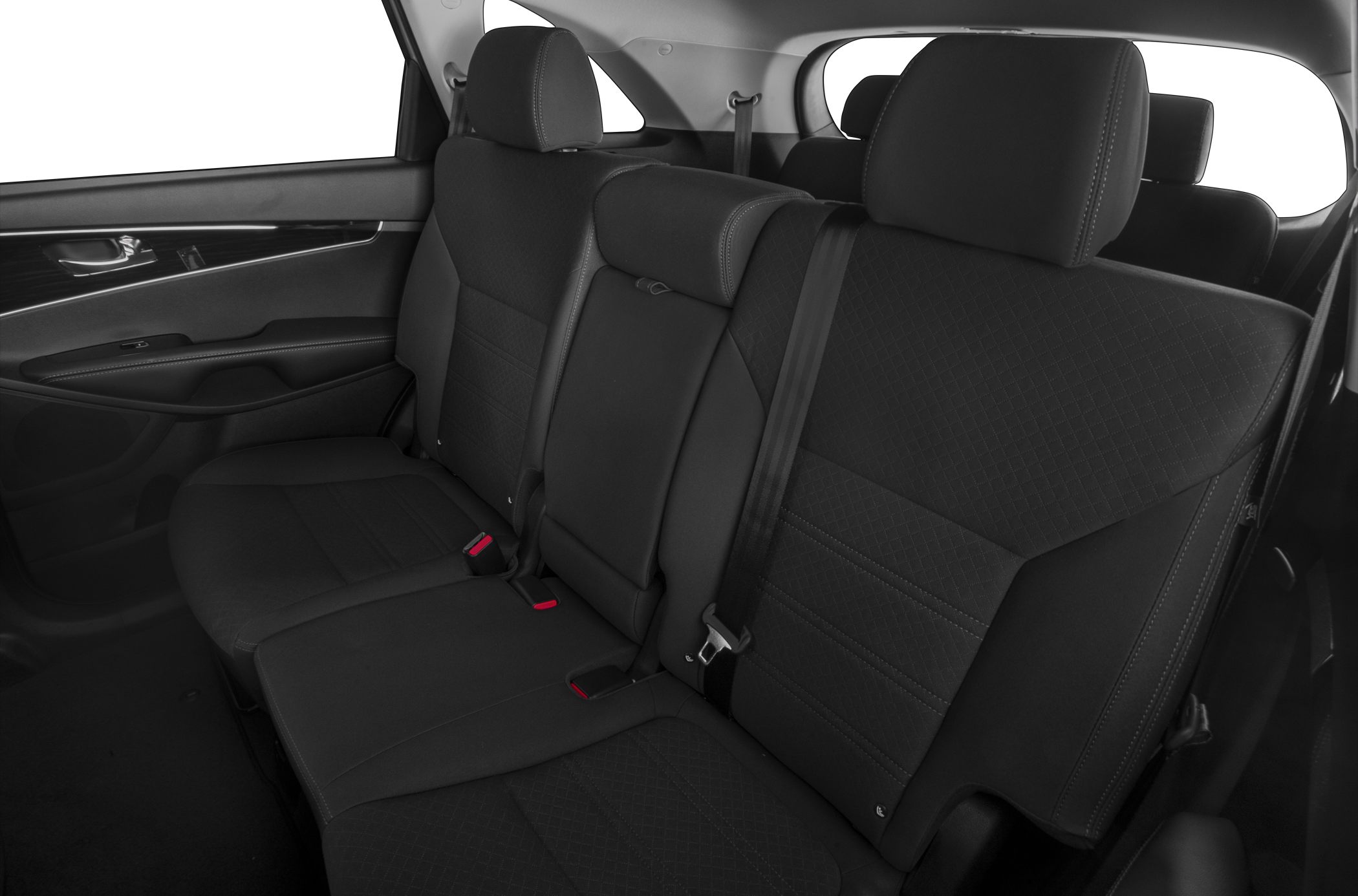 Spacious black rear seating with headrests and seatbelts