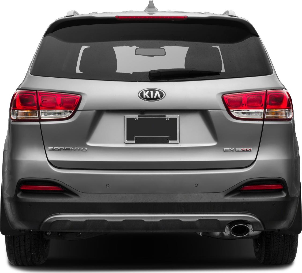 Rear view featuring tail lights, spoiler, and exhaust pipe