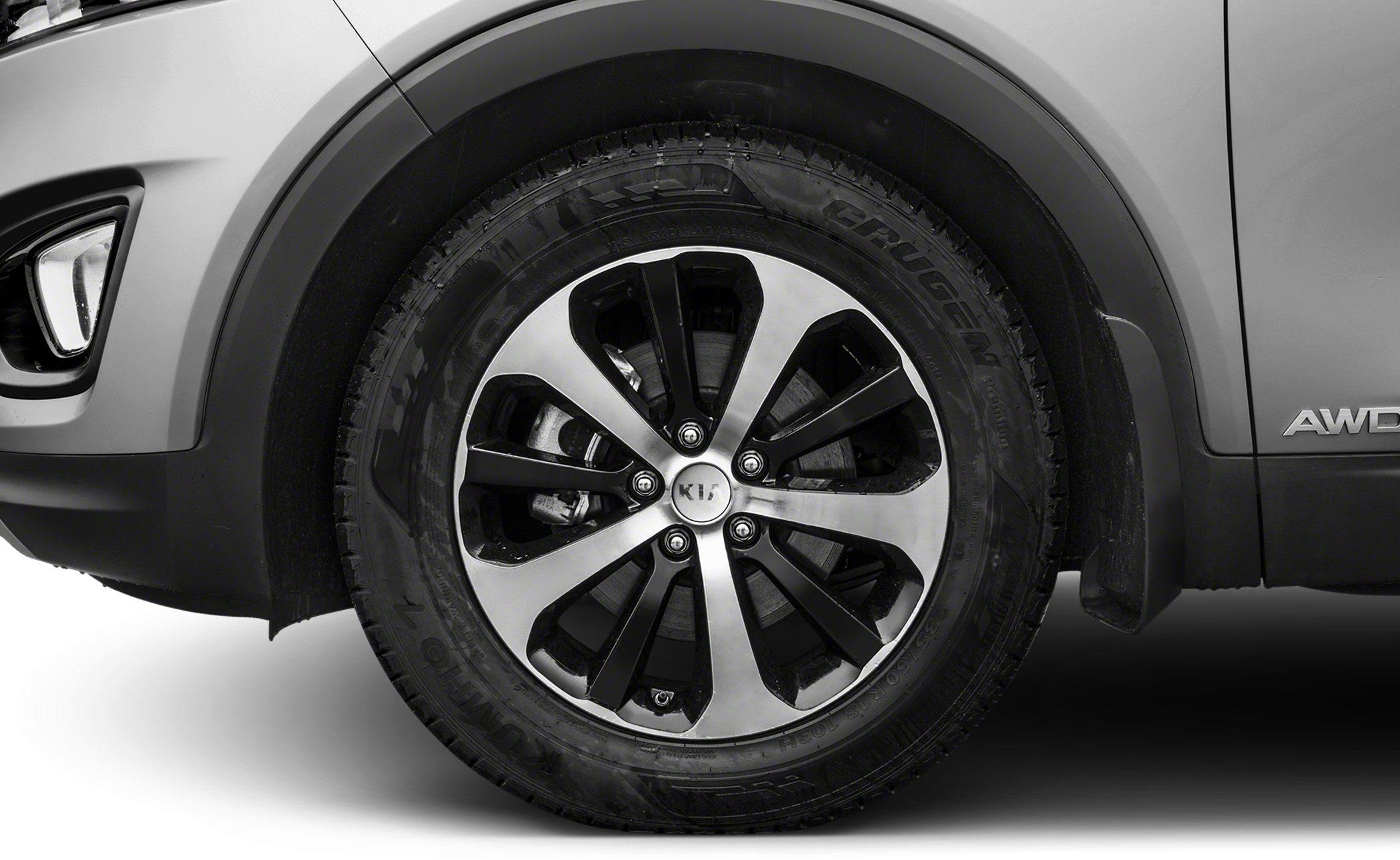 Close-up of alloy wheel and tire on vehicle side