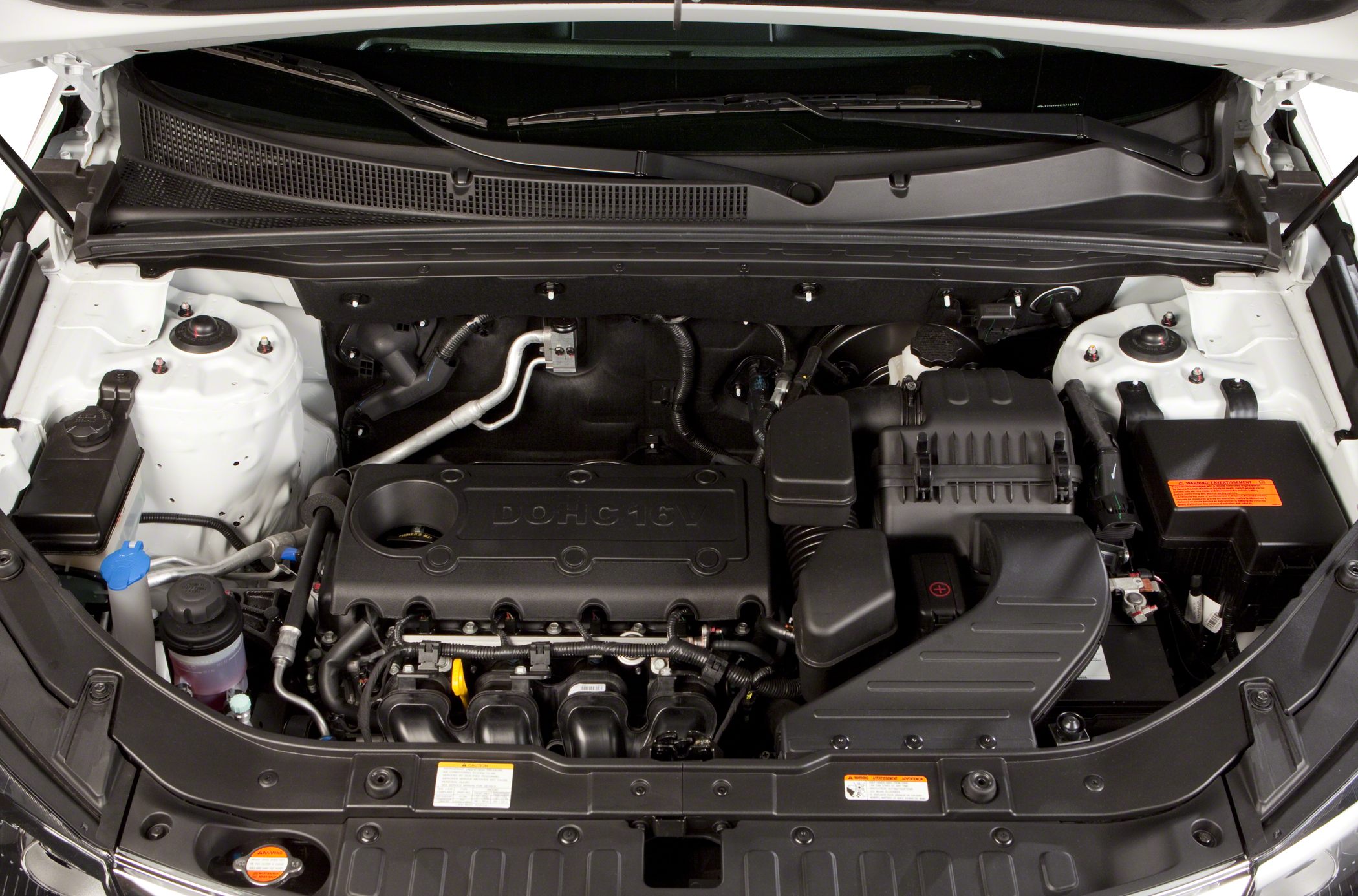Engine bay with DOHC 16V engine layout and visible components