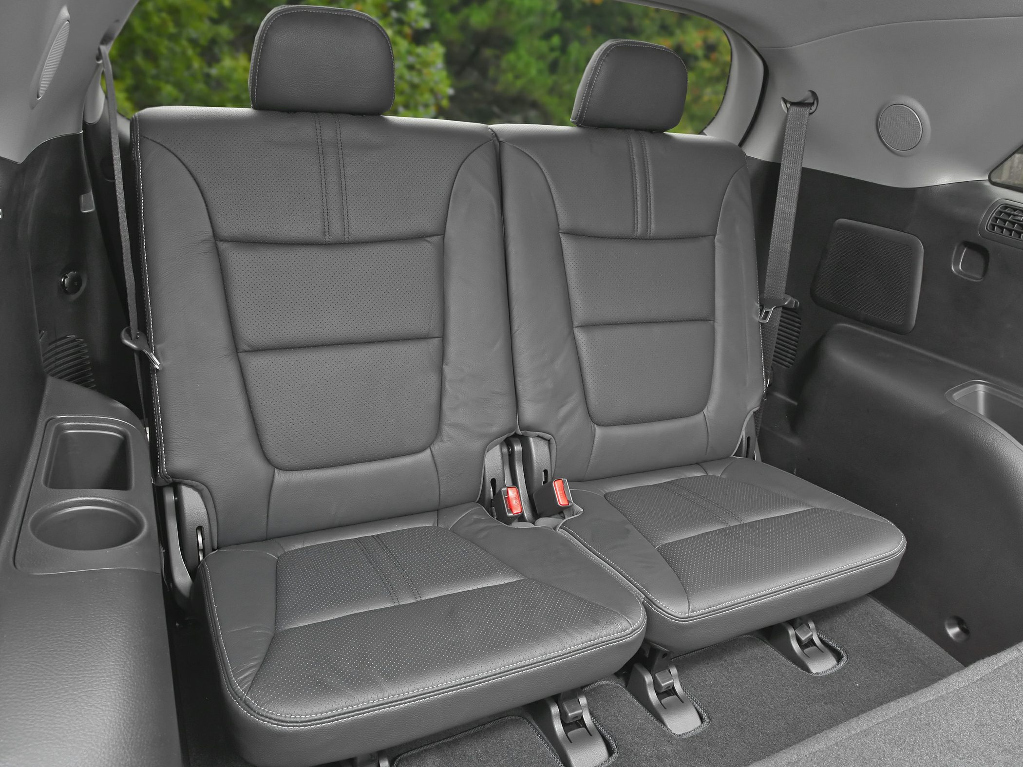 Rear leather seats with headrests and seat belts