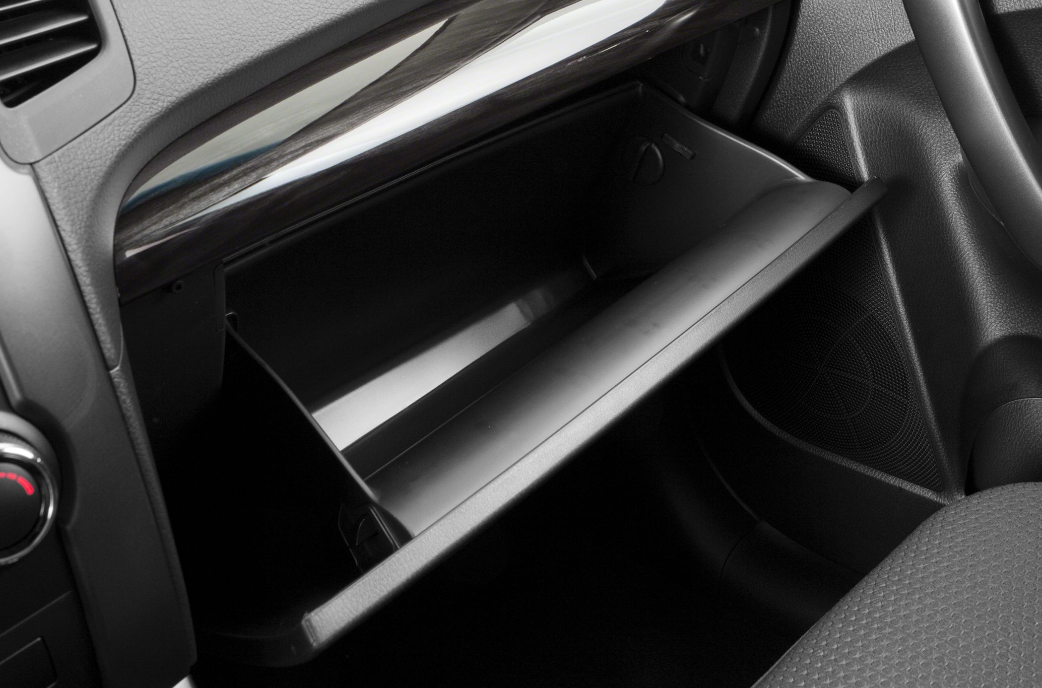 Open glove compartment and surrounding dashboard features